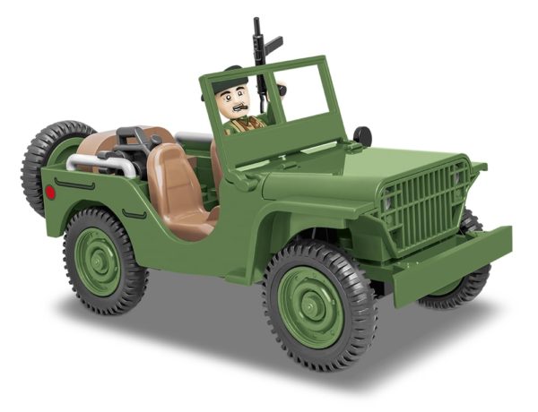 A green Ford GP Vehicle #2400 with a man.
