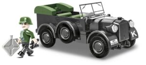 A vintage 1937 Horch 901 (KFZ.15) #2405 is parked adjacent to a military vehicle.