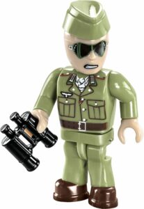 A soldier in a green uniform holding a gun next to a Panzerkmpfwagen IV AUSF. #2546 tank.