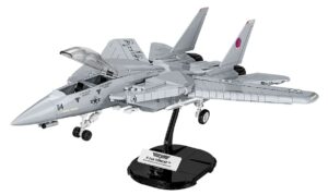 A model of the iconic Top Gun F-14 Tomcat fighter jet on a stand.