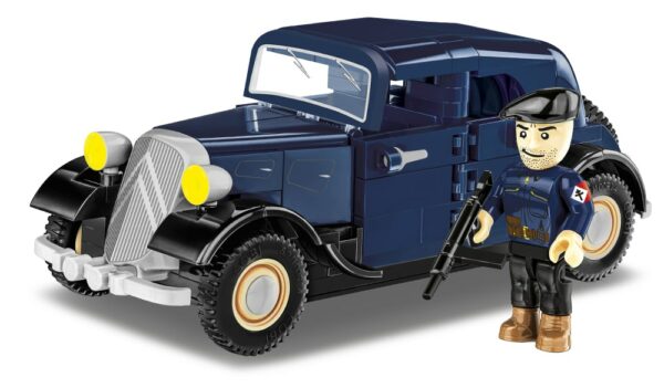 A vintage Citroen Traction 7A #2263 parked alongside a man in the French Resistance era.