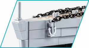 A lego model of the HMS HOOD #4830 with attached chains.