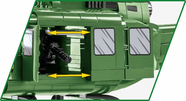 A green Bell UH-1 Huey 650 KL #2423 helicopter with an open door.