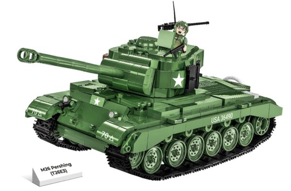 A soldier atop a green M26 Pershing (T26E3) #2564 tank.