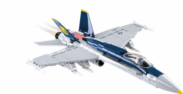 A F/A-18C Hornet #5810 flying on a white background.