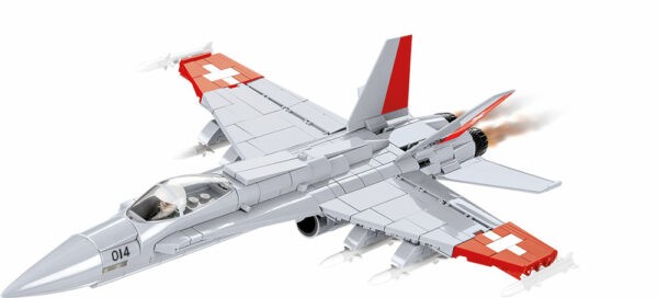 A Swiss F/A-18C Hornet #5819 fighter jet soaring on a white backdrop.