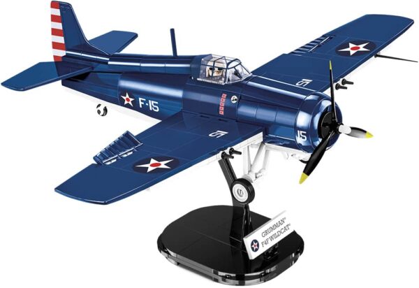 A model of an F4F Wildcat fighter plane on a stand.