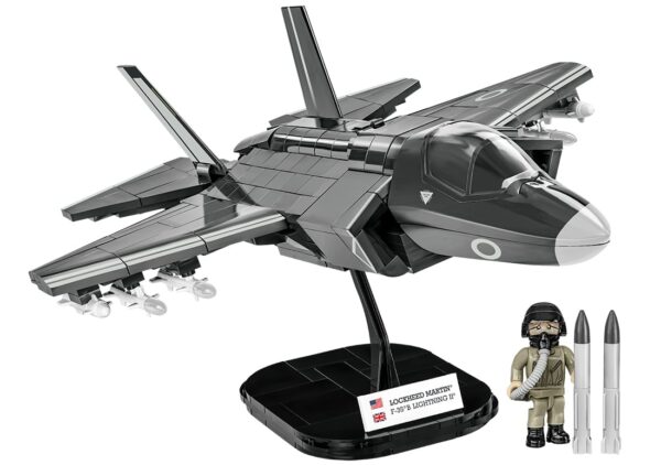 A model of an F-35B Lightning II (RAF) #5830 fighter jet on a stand.