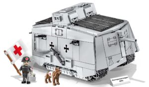 A Sturmpanzerwagen A7V #2989 tank with a soldier and a dog next to it.