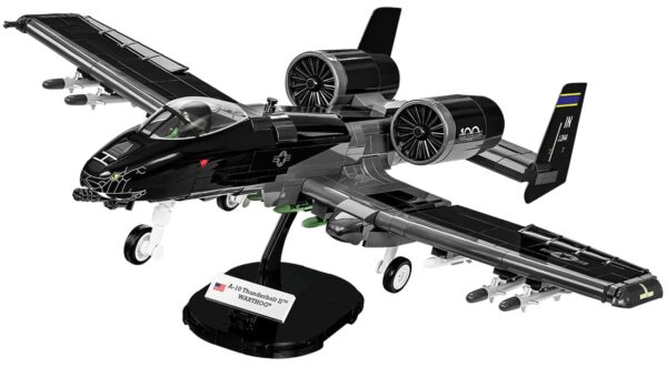 A model of the A-10 Thunderbolt II Warthog "Black Snake" fighter jet displayed on a stand.