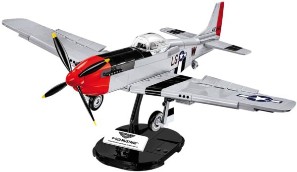 A model of the Top Gun P-51D Mustang #5846 fighter plane on a stand.