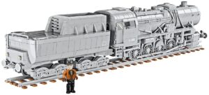 A train set featuring the Kriegslokomotive Baureihe 52 #6281, accompanied by a man.