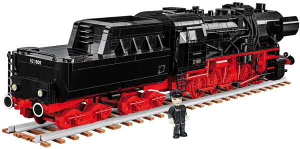 A German Steam Locomotive #6282 with a man standing next to it.