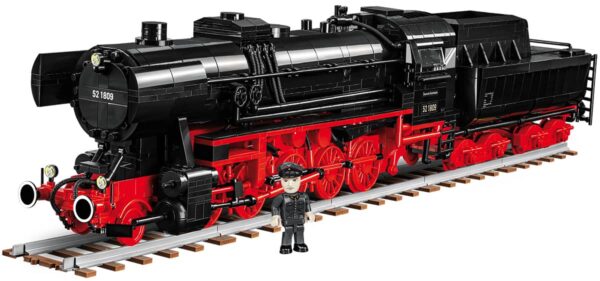 DRB Class 52 German Steam Locomotive #6282 displayed alongside a man.
