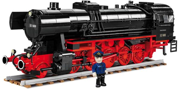 Tugdual is standing next to his Cobi Steam Locomotive DRB Class 52 #6283.